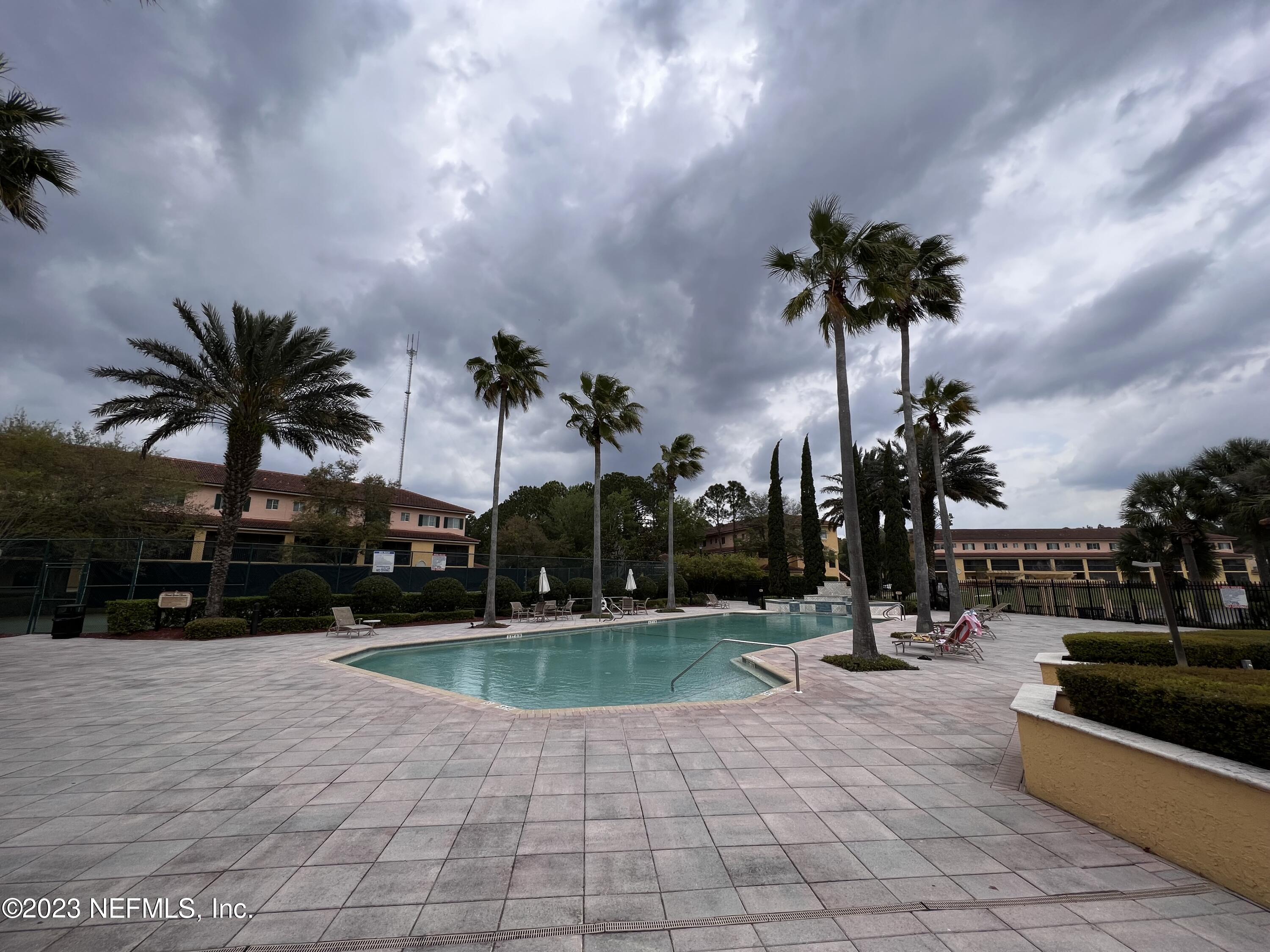 9745 Touchton Road, Unit 1702 Jacksonville, FL 32246 - Photo 53 of 62 an outdoor space with lots of palm trees