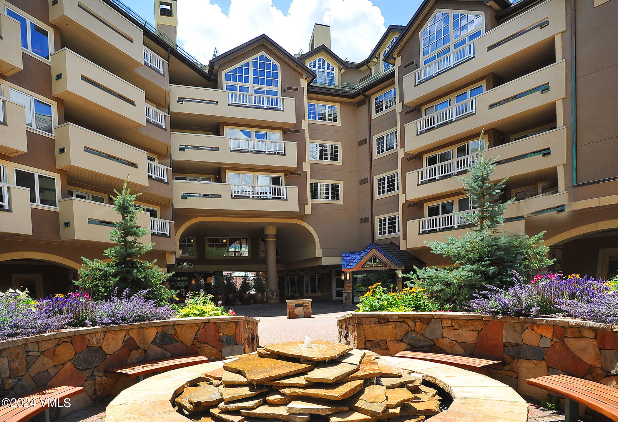 210 Offerson Road, Unit R41026 Beaver Creek, CO 81620 - Photo 1 of 23 a front view of a building with plants
