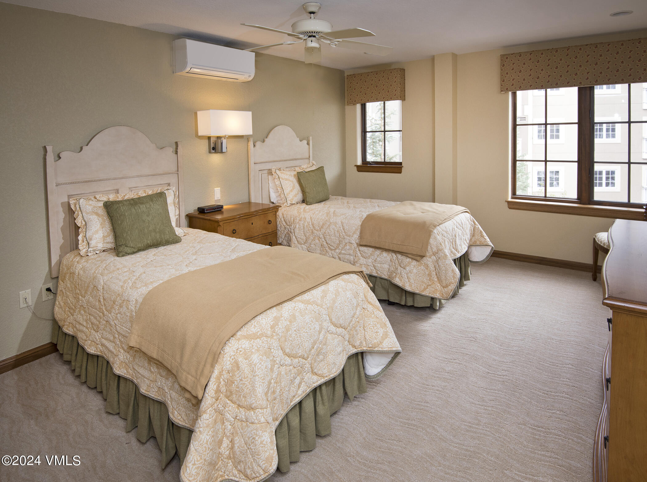 210 Offerson Road, Unit R41026 Beaver Creek, CO 81620 - Photo 10 of 23 a bedroom with two beds and a large window