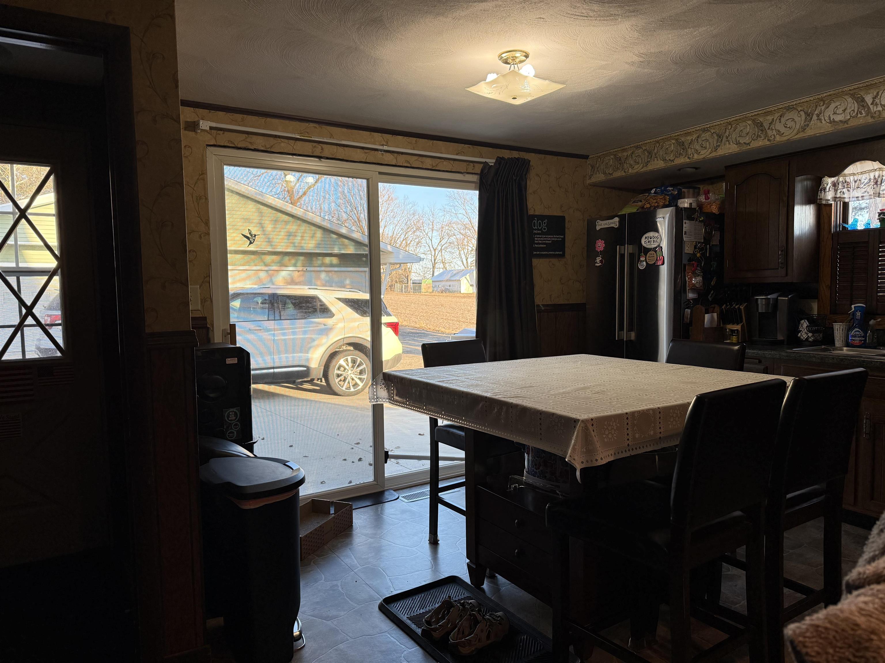629 North Dakota Road Ridott, IL 61067 - Photo 7 of 26 a view of a dining room with furniture window and outside view