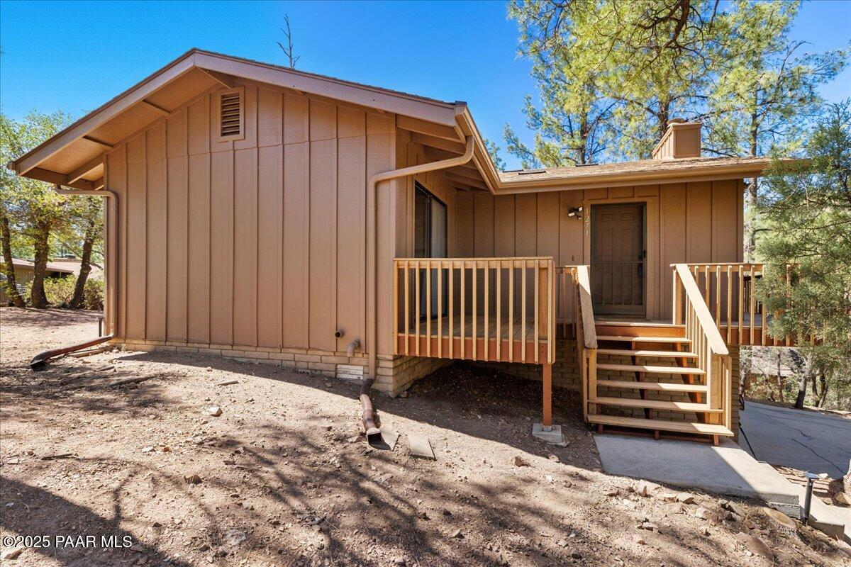 1271 Tanglewood Road Prescott, AZ 86303 - Photo 1 of 18 a view of a house with a yard