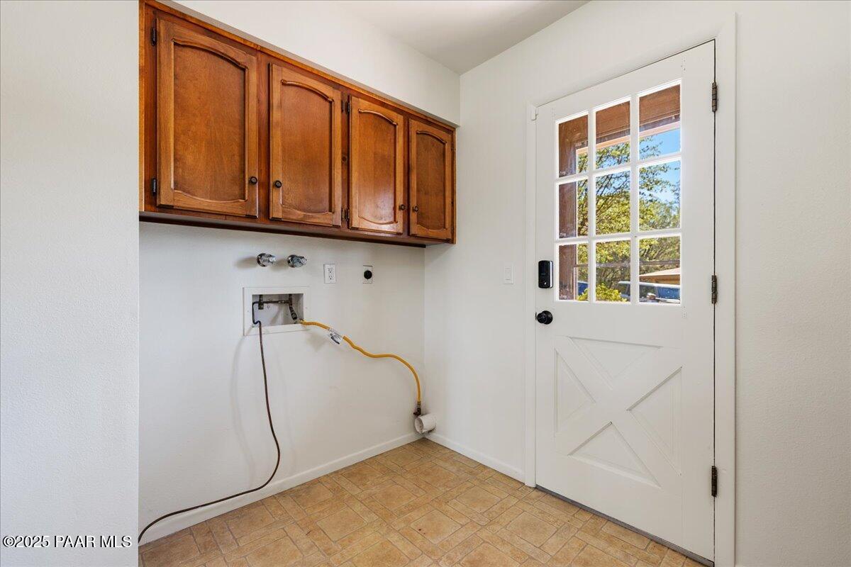 1271 Tanglewood Road Prescott, AZ 86303 - Photo 14 of 18 a picture of a room with window and a ceiling fan