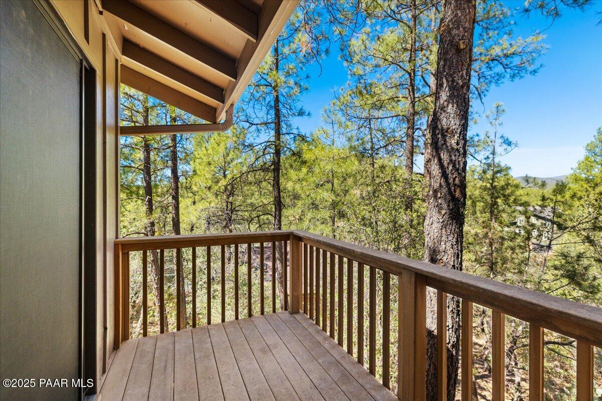 1271 Tanglewood Road Prescott, AZ 86303 - Photo 16 of 18 a view of a balcony with wooden floor