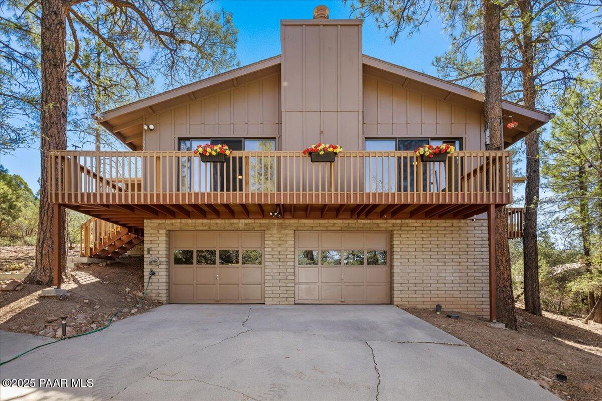 1271 Tanglewood Road Prescott, AZ 86303 - Photo 2 of 18 a view of a house with roof deck front of house