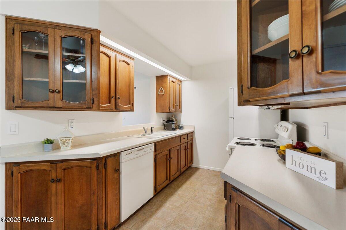 1271 Tanglewood Road Prescott, AZ 86303 - Photo 9 of 18 a utility room with sink dryer and washer