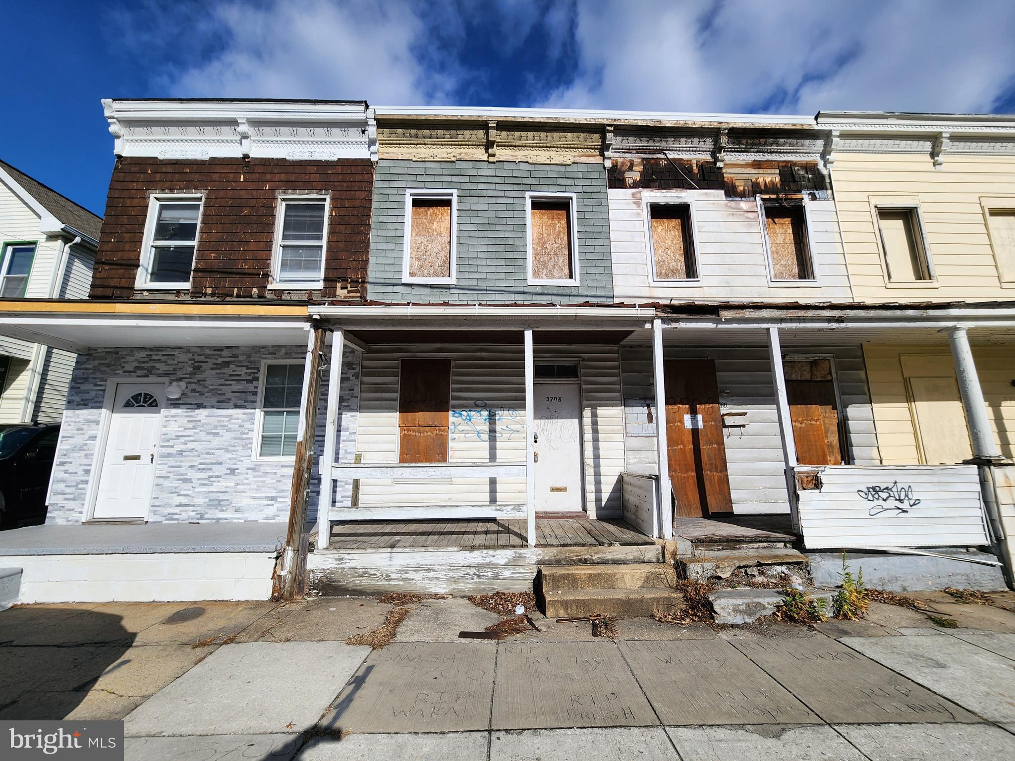 3708 Old Frederick Road Baltimore, MD 21229 - Photo 1 of 7 a view of a building with many windows