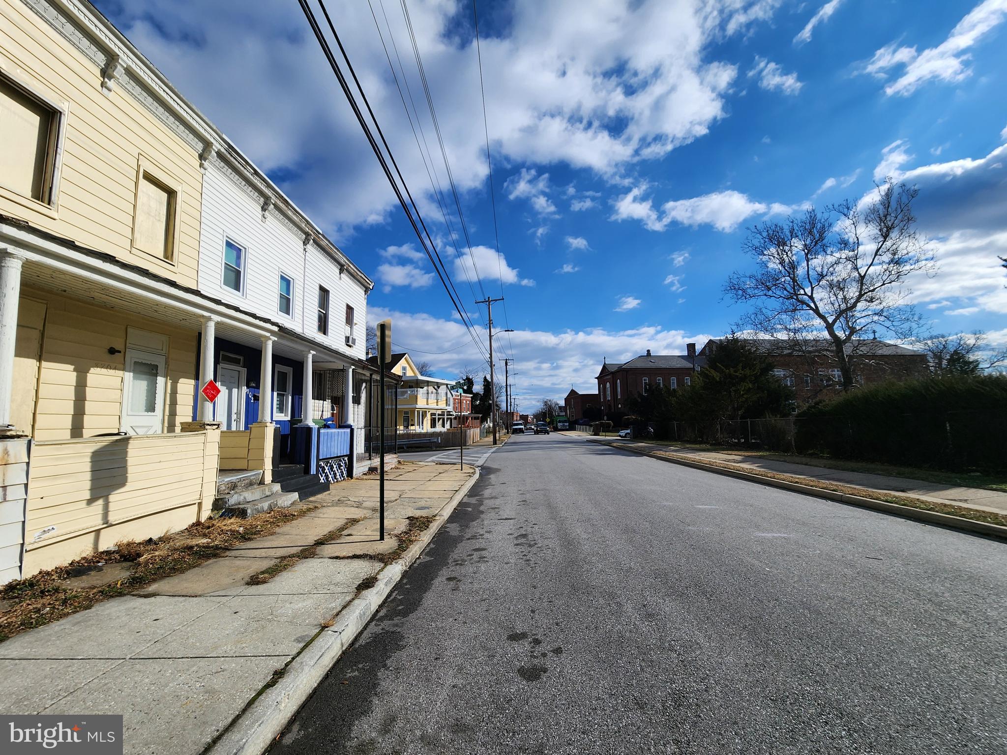 3708 Old Frederick Road Baltimore, MD 21229 - Photo 6 of 7 a view of a street with cars