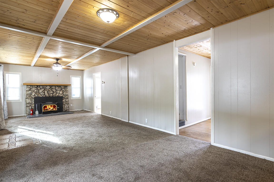 26805 Idyllwild Road Idyllwild, CA 92549 - Photo 9 of 29 a view of an empty room with a fireplace