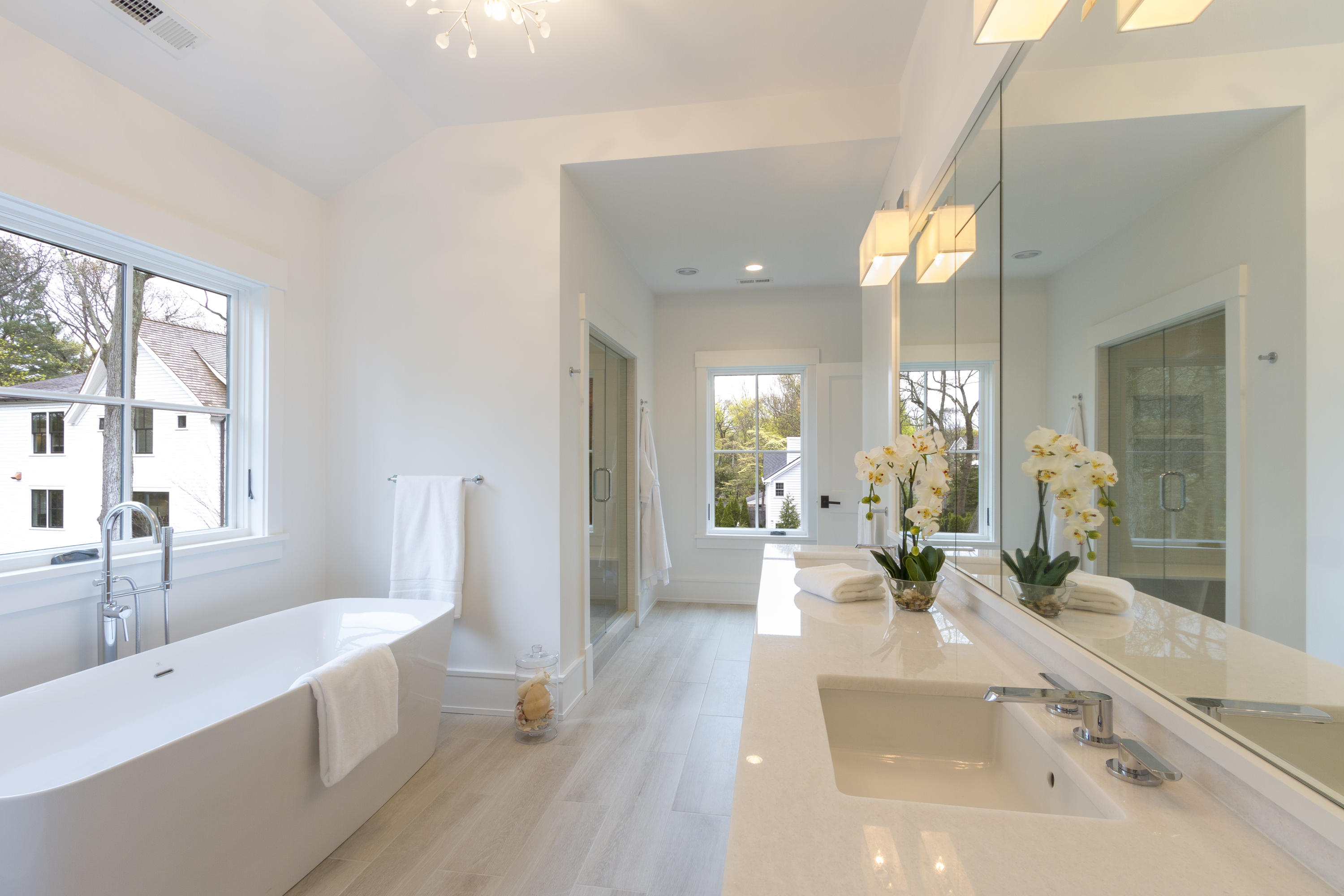 14 Clocks Lane Darien, CT 06820 - Photo 26 of 46 a large white kitchen with a large window and stainless steel appliances