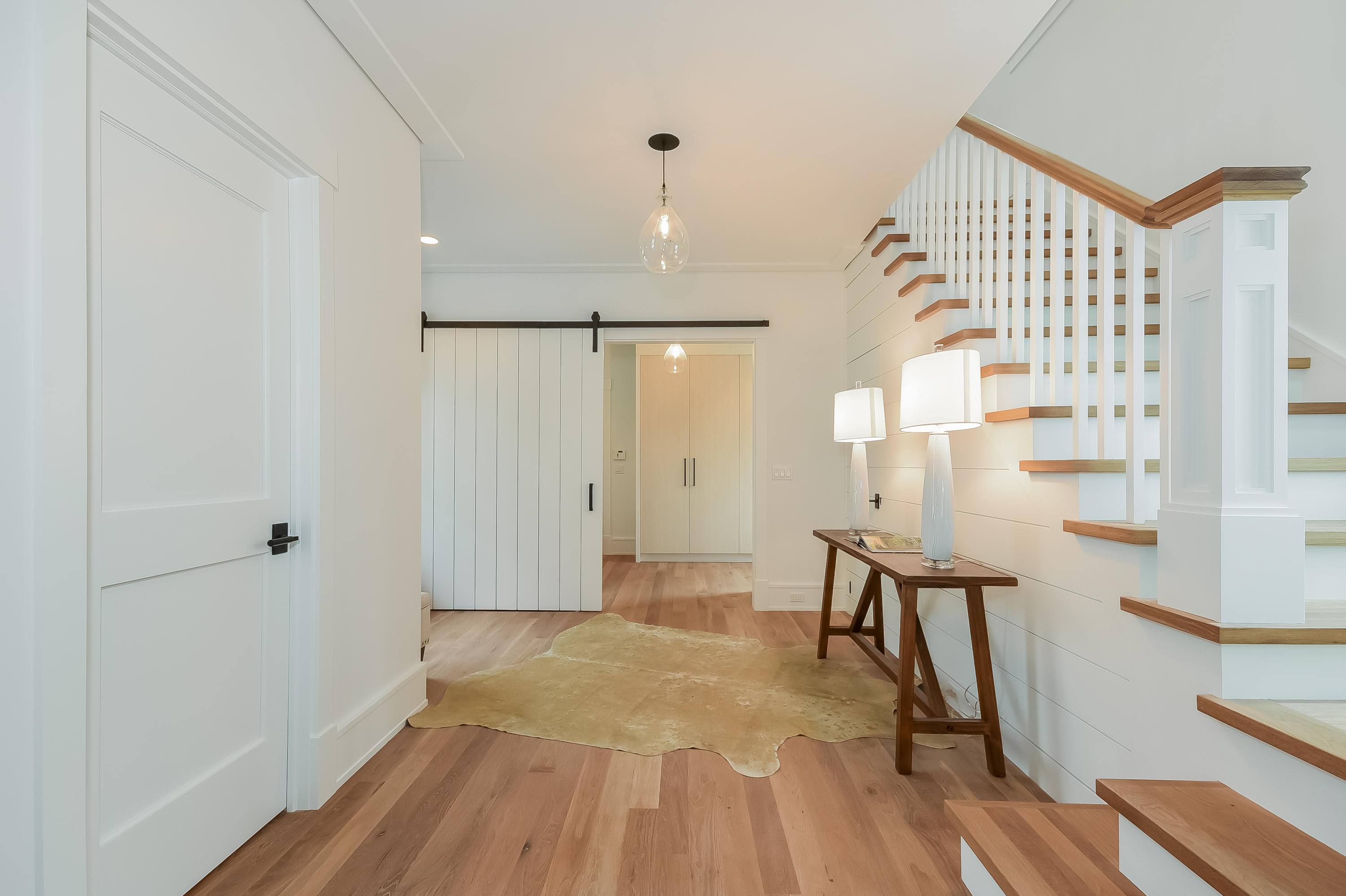 14 Clocks Lane Darien, CT 06820 - Photo 3 of 46 a view of empty room with wooden floor