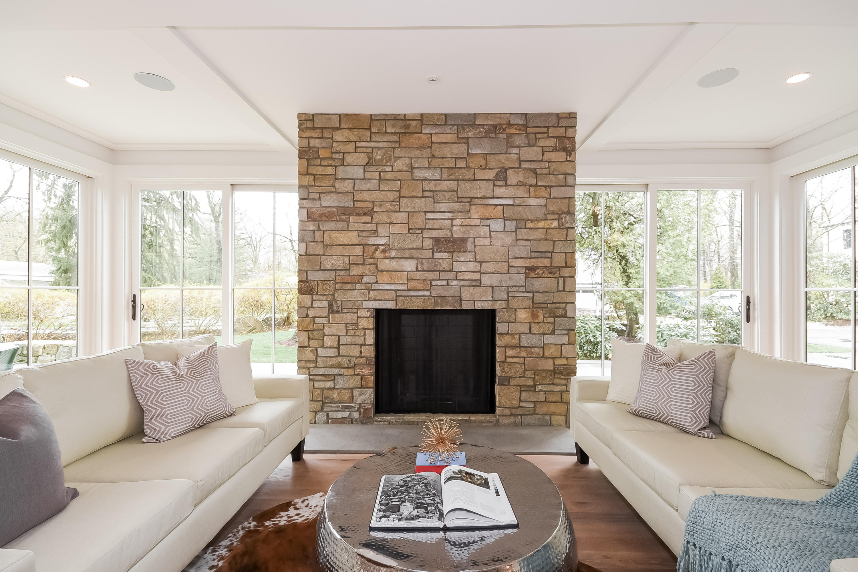 14 Clocks Lane Darien, CT 06820 - Photo 8 of 46 a living room with furniture and a fireplace