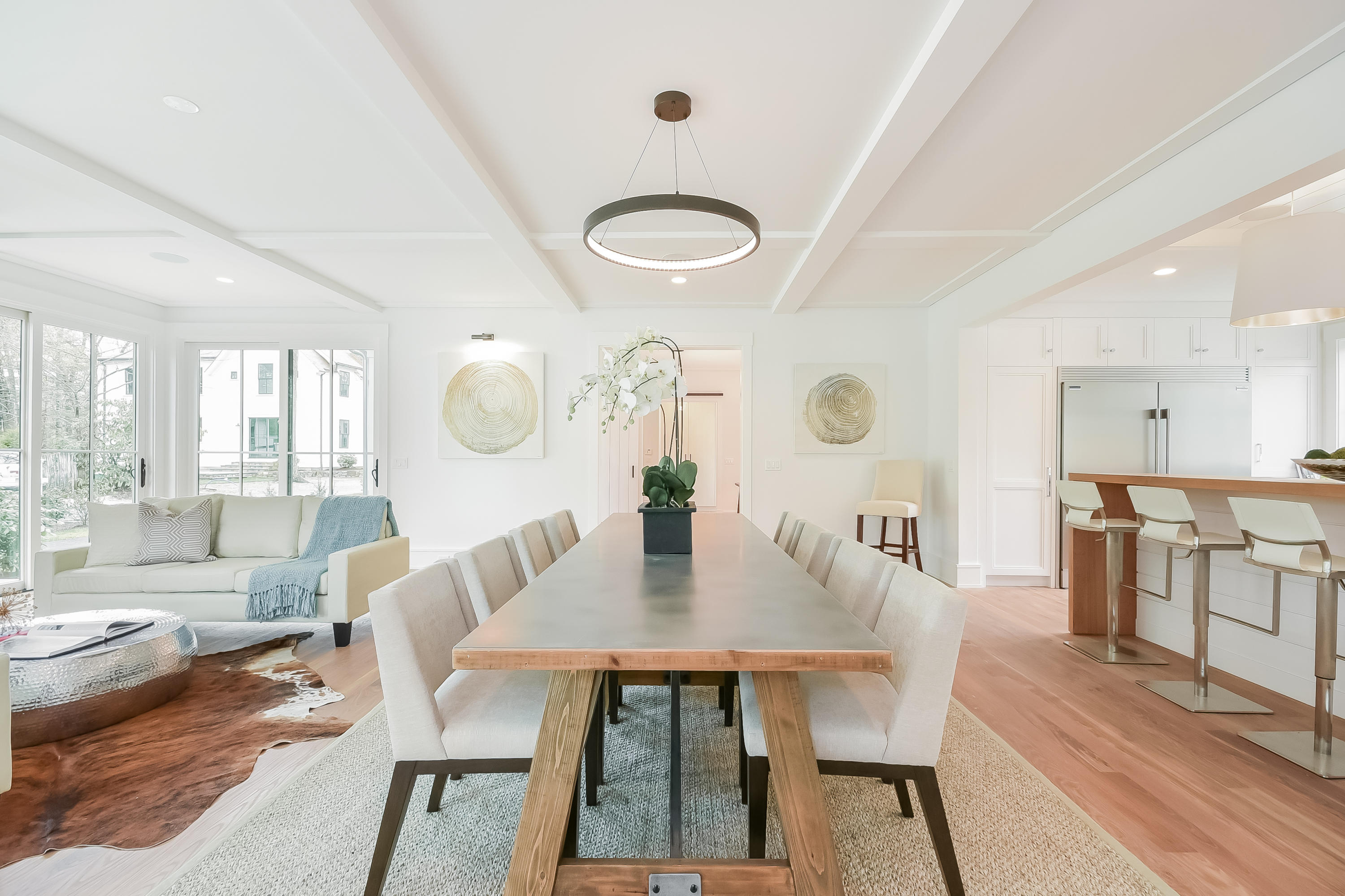 14 Clocks Lane Darien, CT 06820 - Photo 9 of 46 a view of a dining room with furniture and wooden floor