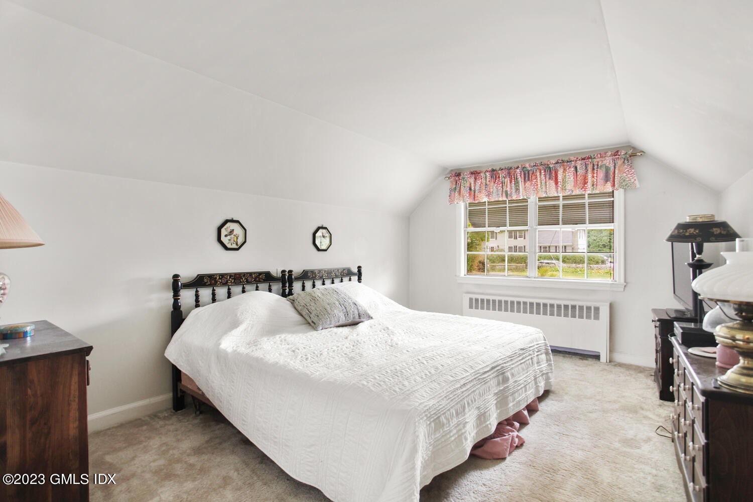 180 Byram Shore Road Greenwich, CT 06830 - Photo 12 of 29 a bedroom with a bed and a window