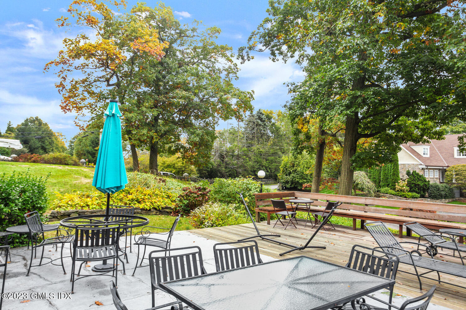 180 Byram Shore Road Greenwich, CT 06830 - Photo 14 of 29 a view of an chairs and tables in the patio