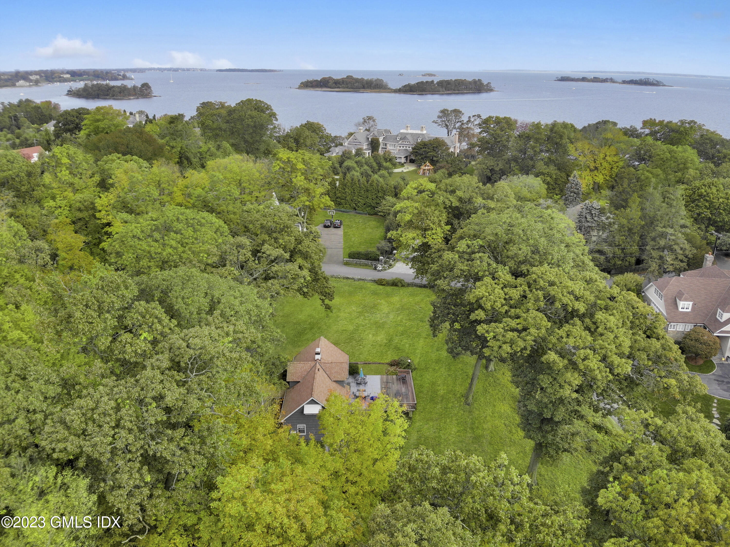 180 Byram Shore Road Greenwich, CT 06830 - Photo 20 of 29 a view of a lake with a city