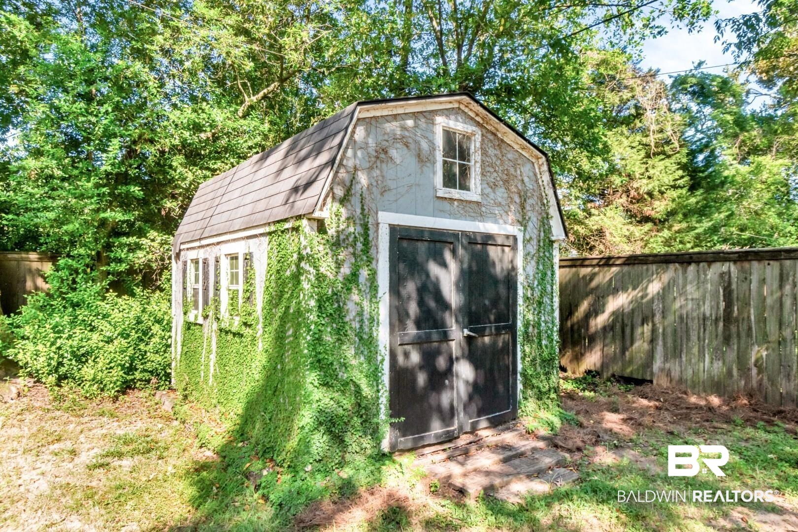 18 Princess Anne Road Mobile, AL 36608 - Photo 37 of 41 View of shed featuring a fenced backyard