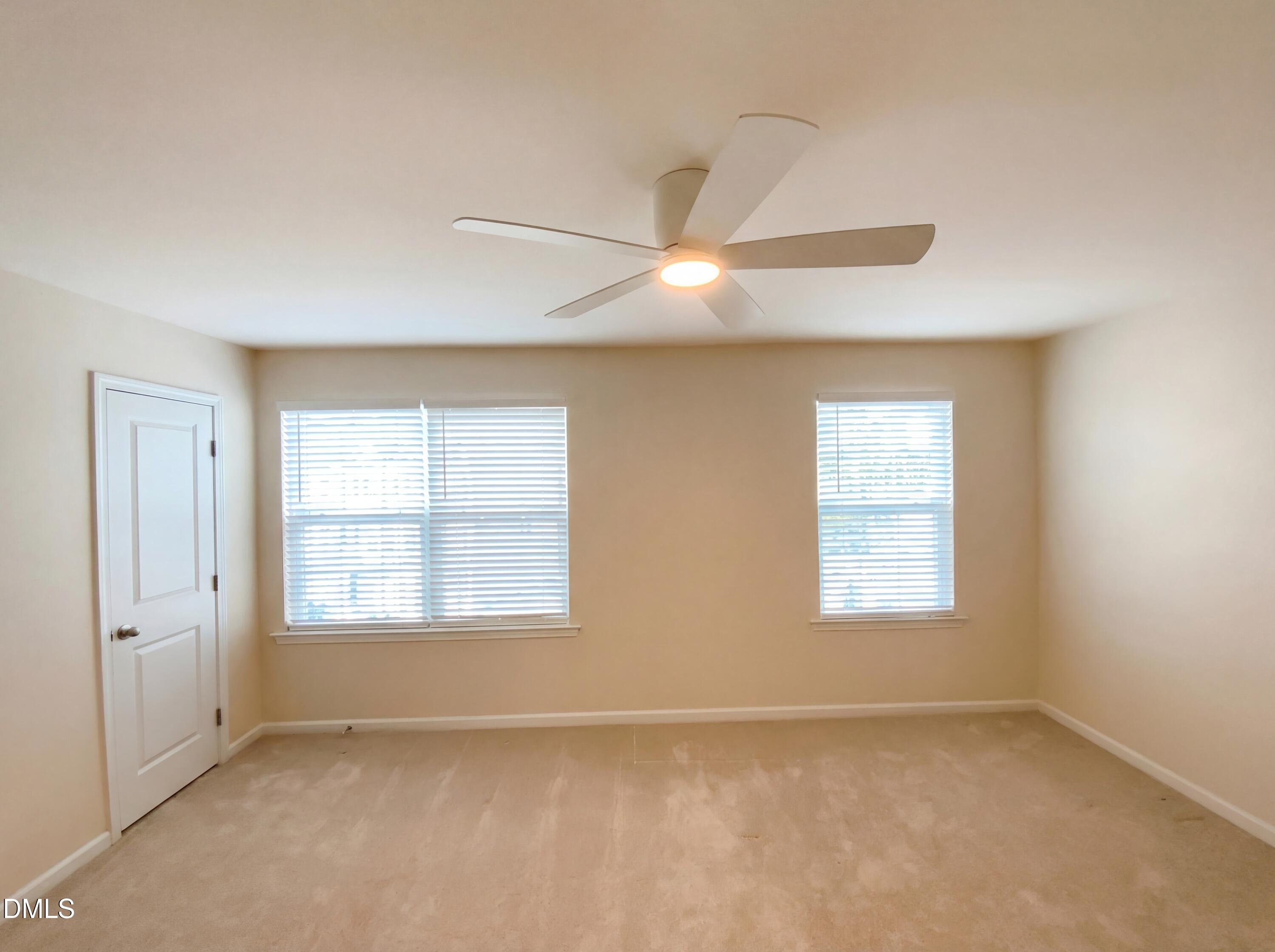 1661 Holly Grove Way Durham, NC 27713 - Photo 12 of 19 a view of an empty room with a window