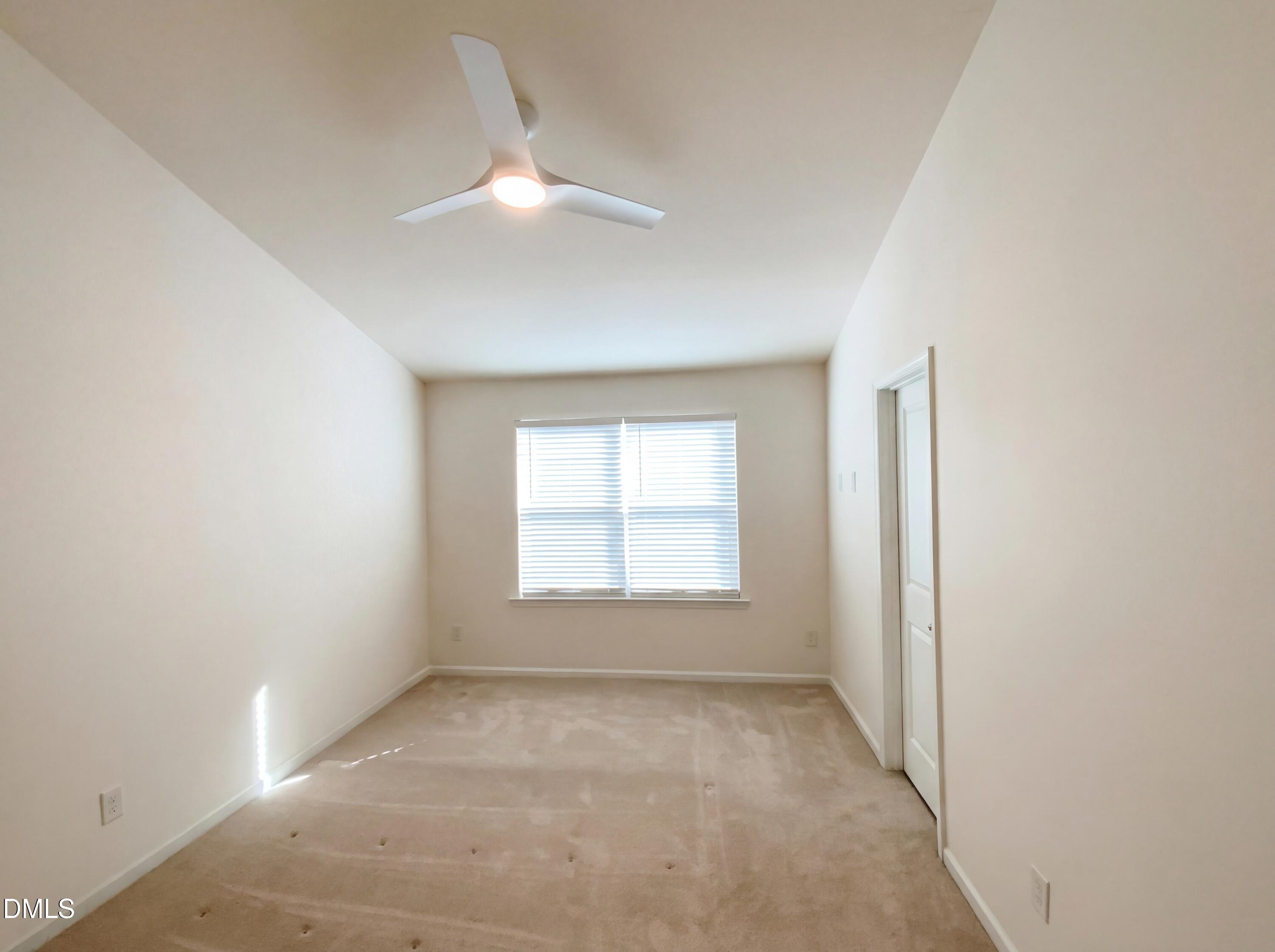 1661 Holly Grove Way Durham, NC 27713 - Photo 14 of 19 an empty room with a window