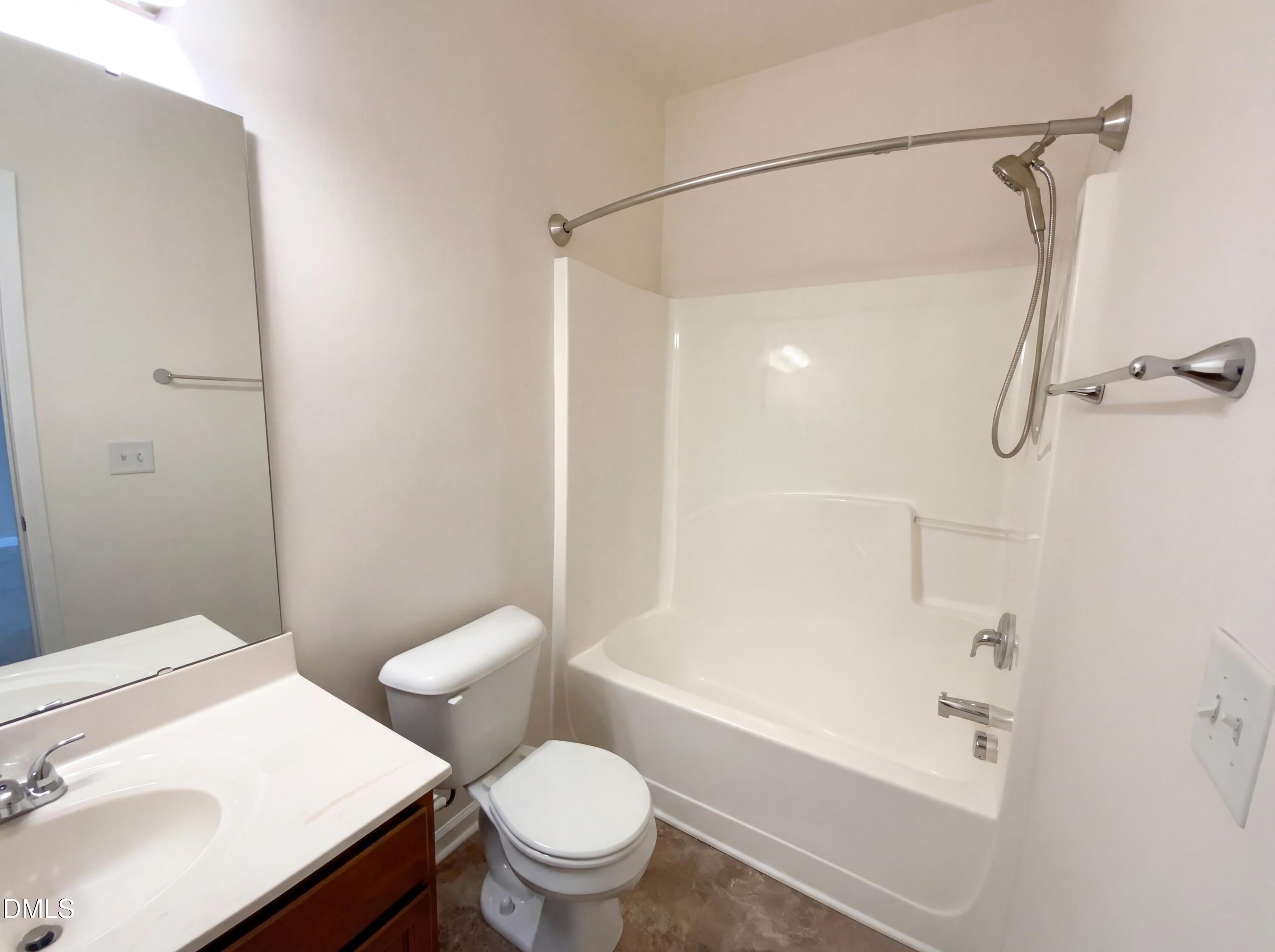 1661 Holly Grove Way Durham, NC 27713 - Photo 6 of 19 a white toilet sitting next to a bath tub