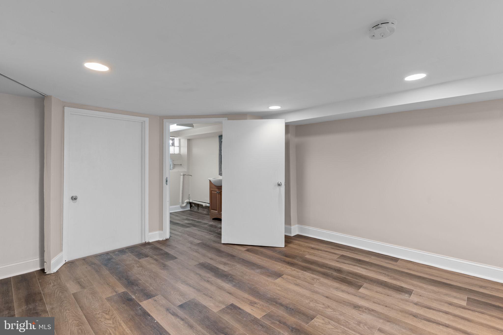 7122 Gillespie Street Philadelphia, PA 19135 - Photo 18 of 24 a view of hallway with wooden floor