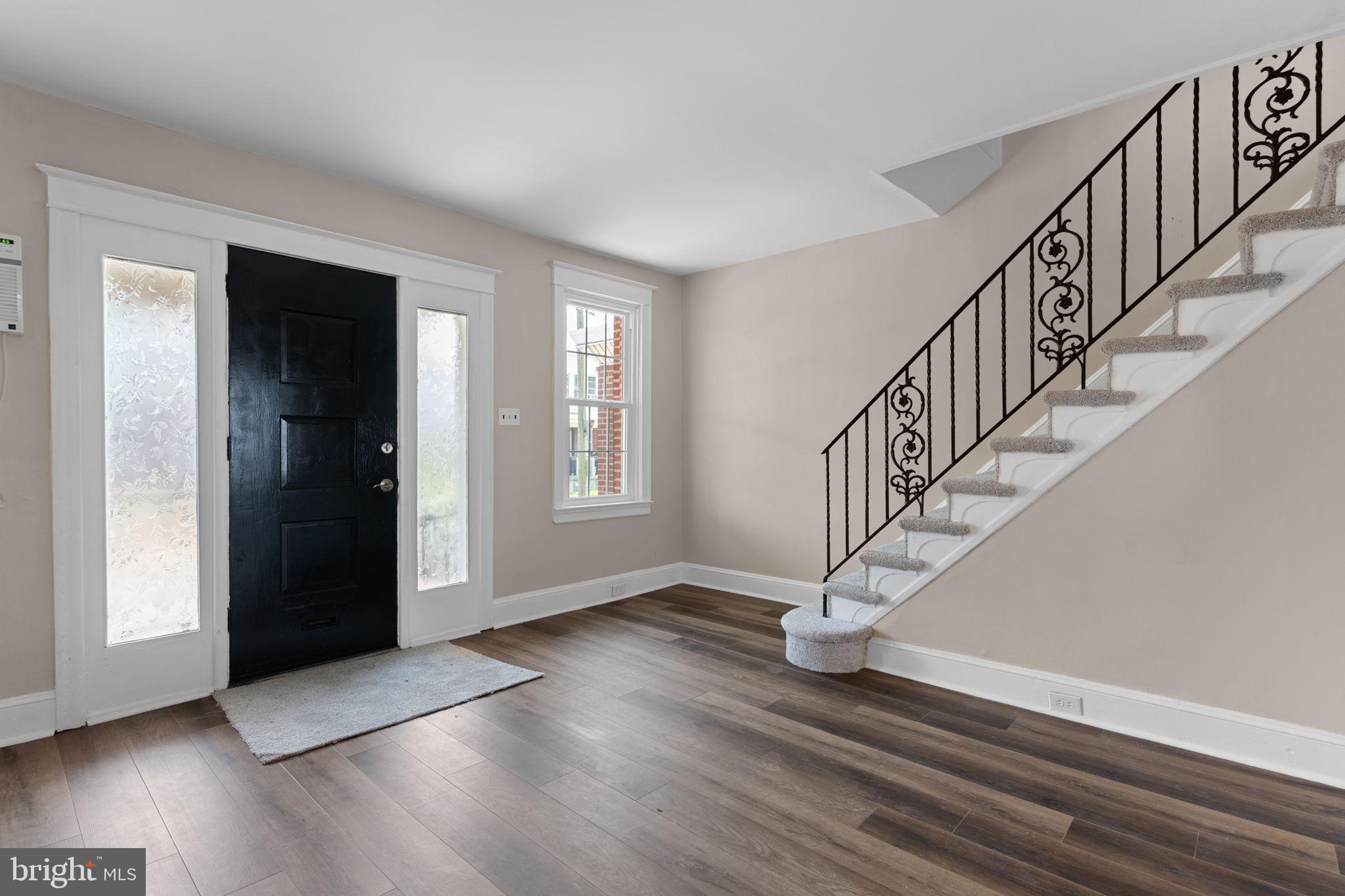 7122 Gillespie Street Philadelphia, PA 19135 - Photo 5 of 24 a view of entryway with wooden floor