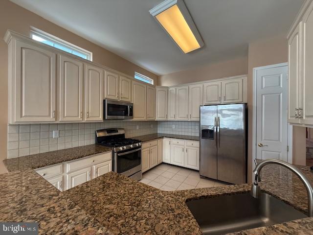 121 Einstein Way Cranbury, NJ 08512 - Photo 11 of 33 a kitchen with stainless steel appliances granite countertop a stove a sink and a refrigerator