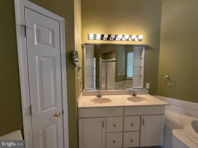 121 Einstein Way Cranbury, NJ 08512 - Photo 15 of 33 a bathroom with a sink and a mirror