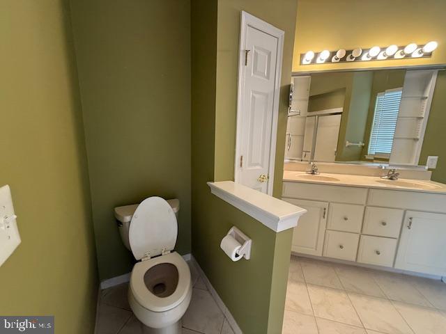 121 Einstein Way Cranbury, NJ 08512 - Photo 20 of 33 a bathroom with a toilet mirror and vanity