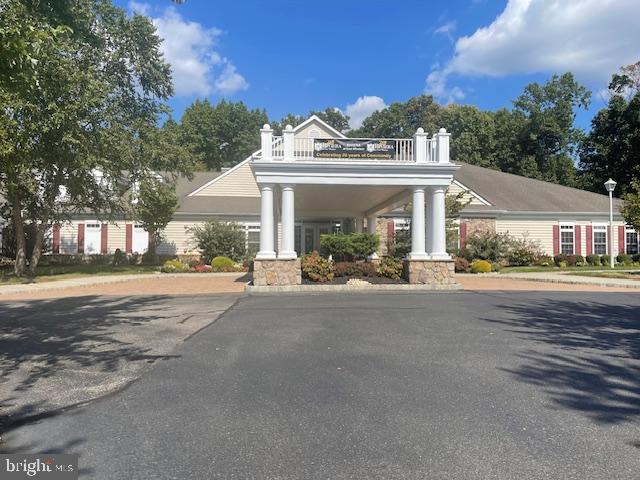 121 Einstein Way Cranbury, NJ 08512 - Photo 27 of 33 a view of a house with a garden and pathway