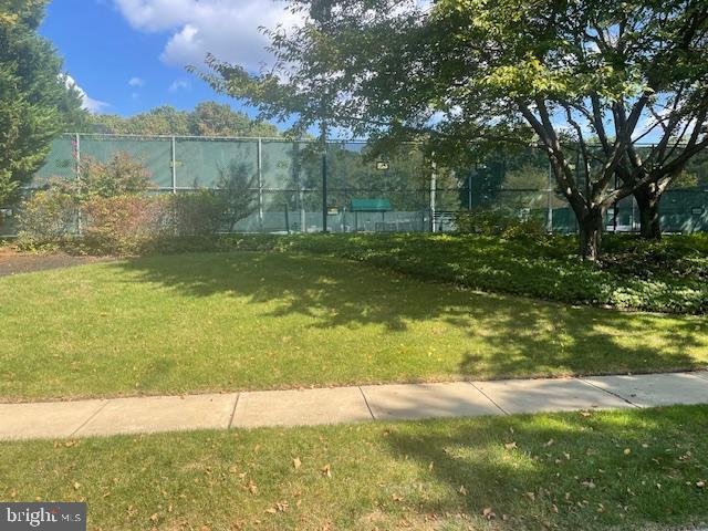 121 Einstein Way Cranbury, NJ 08512 - Photo 33 of 33 a view of a lake with a yard and large trees