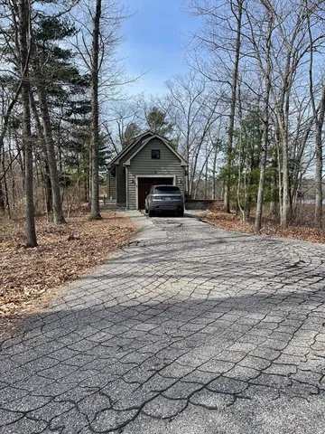a house with trees in front of it