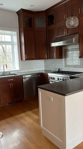 a house with trees in the background