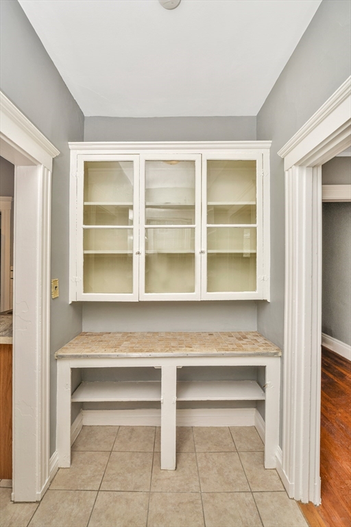 146 Homestead Street Boston, MA 02121 - Photo 25 of 40 a view of an empty room with a window