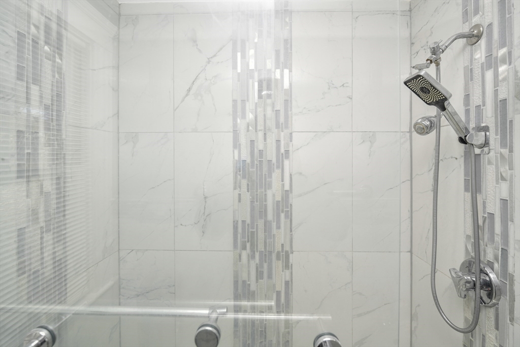 146 Homestead Street Boston, MA 02121 - Photo 29 of 40 a bathroom with a shower