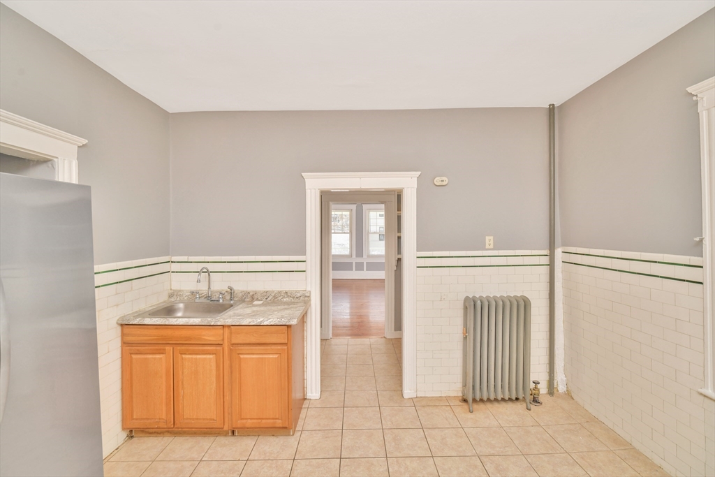 146 Homestead Street Boston, MA 02121 - Photo 6 of 40 a view of front door with hallway