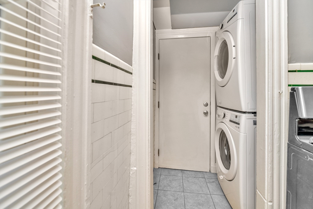 146 Homestead Street Boston, MA 02121 - Photo 10 of 40 a utility room with dryer and washer