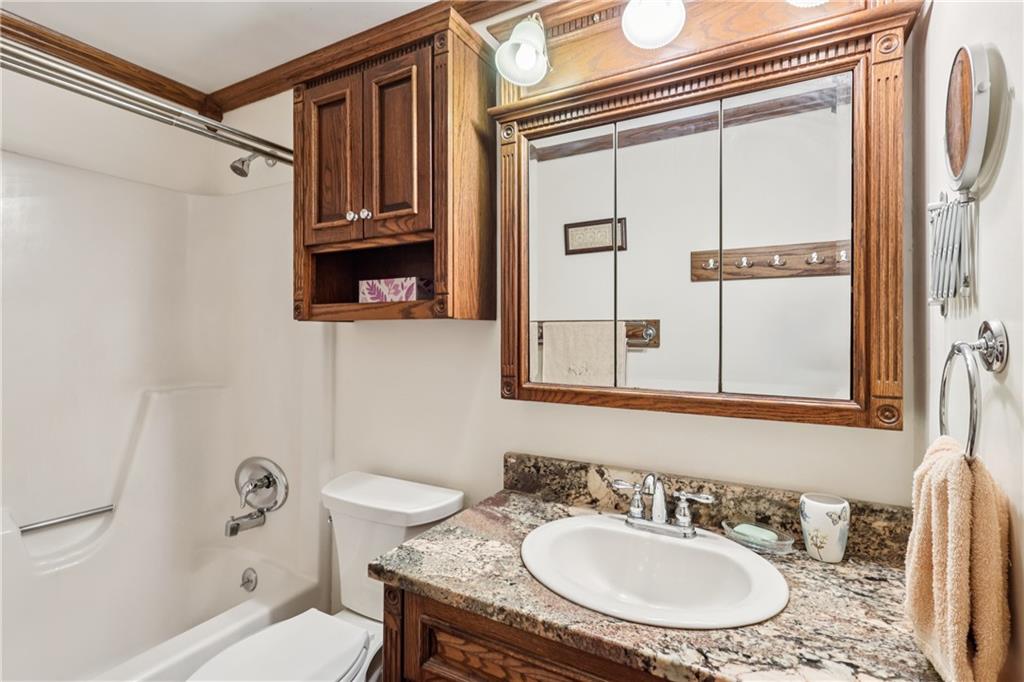 712 North 16th Street North Apollo, PA 15673 - Photo 20 of 25 a bathroom with a sink and a mirror