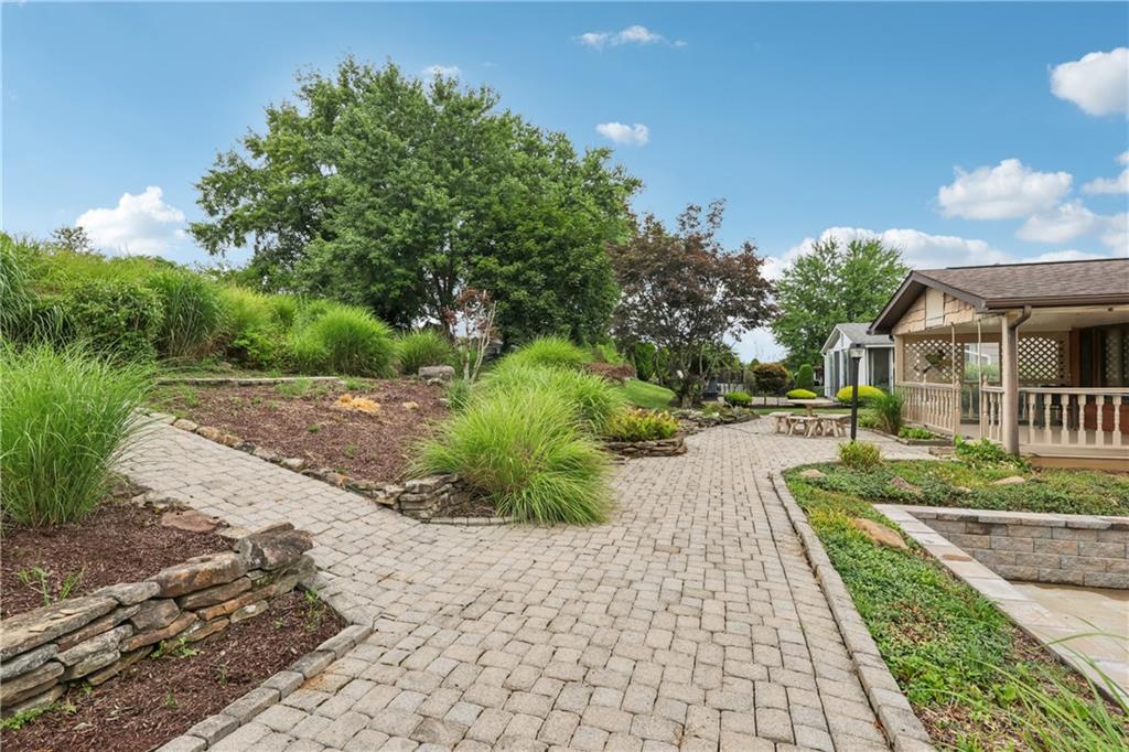712 North 16th Street North Apollo, PA 15673 - Photo 8 of 25 a view of a street with a yard and a fountain