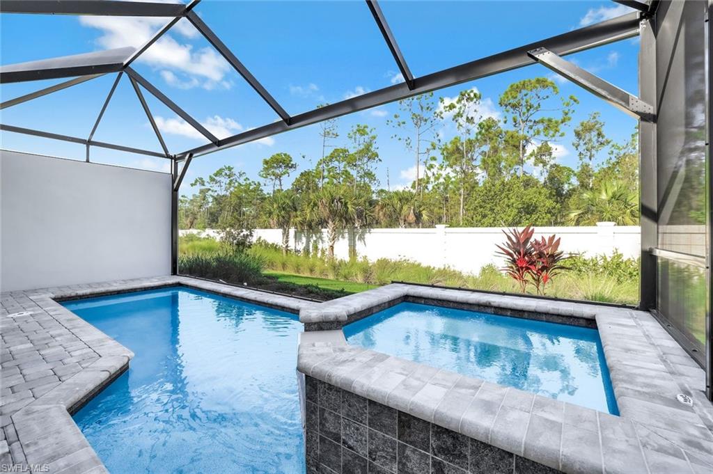 8921 Yucatan Court Naples, FL 34113 - Photo 15 of 20 a view of sitting area