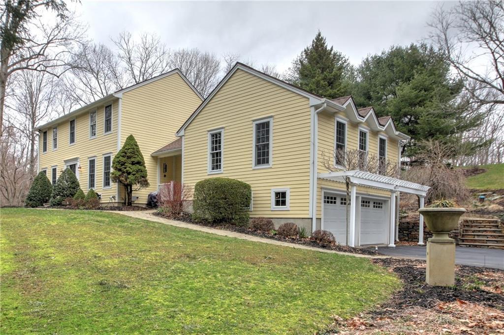 68 Hammertown Road Monroe, CT 06468 - Photo 1 of 1 a view of a house with a yard and large tree
