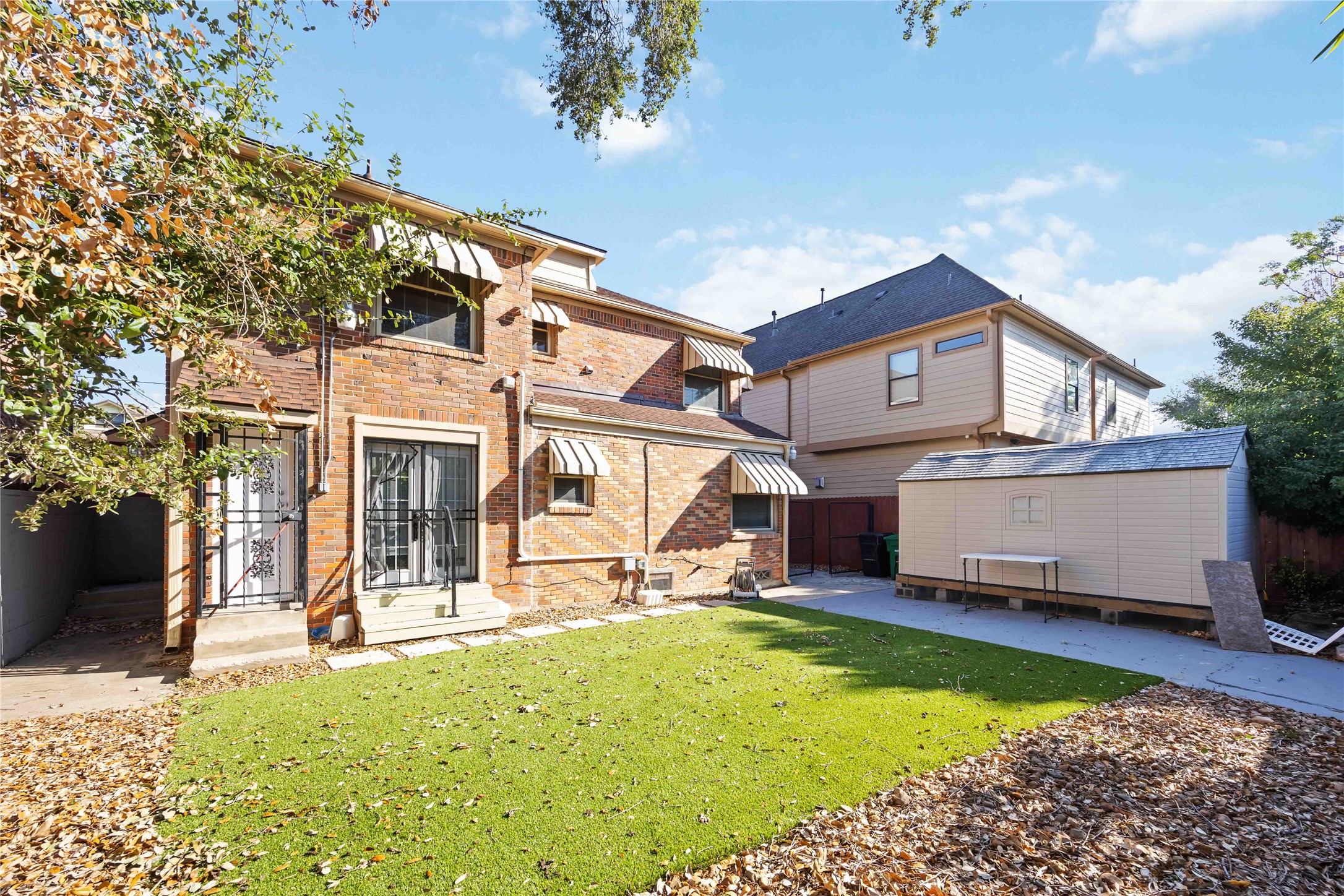 2104 Winbern Street Houston, TX 77004 - Photo 24 of 24 a view of a house with a swimming pool