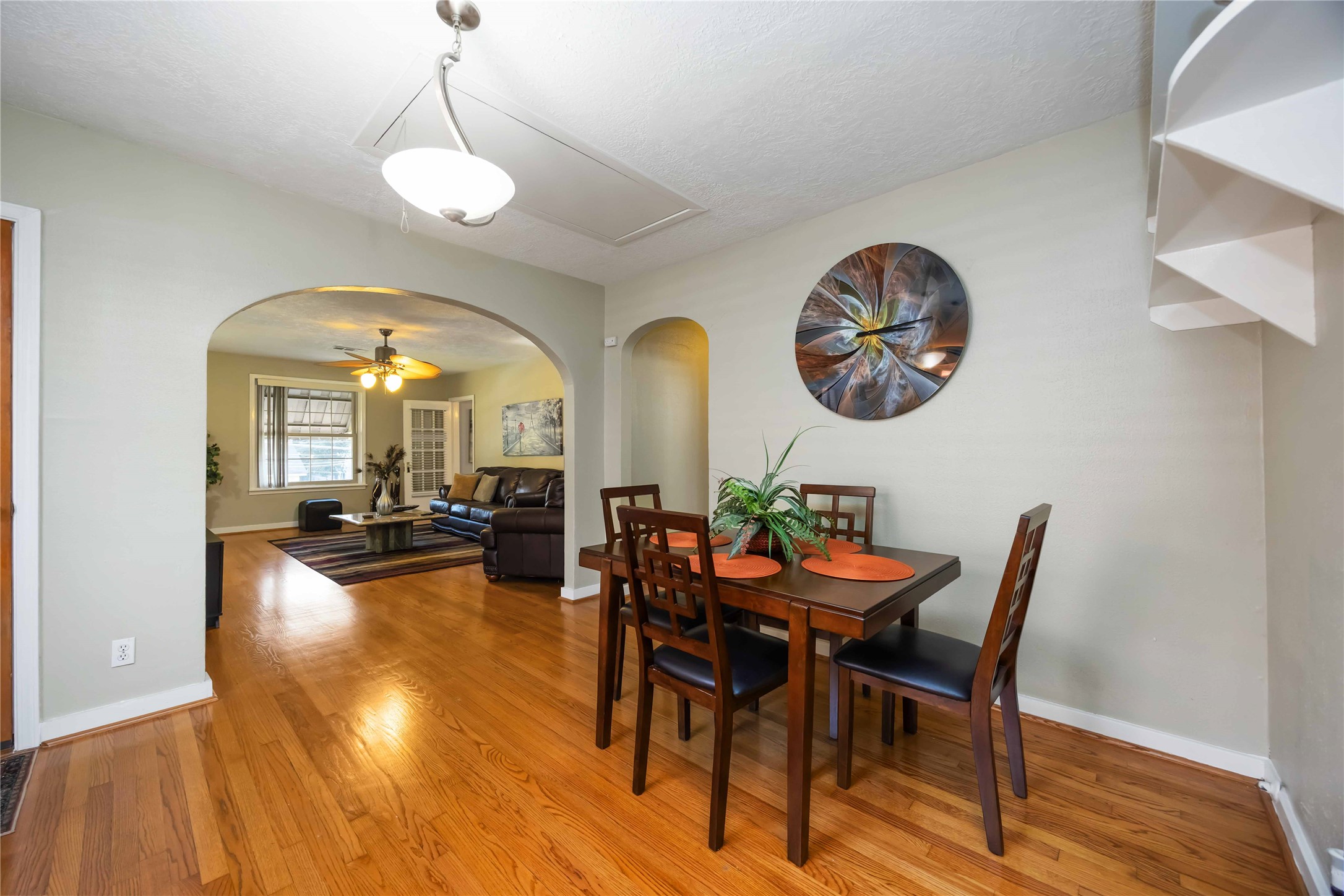 2104 Winbern Street Houston, TX 77004 - Photo 7 of 24 a view of a dining room with furniture and a chandelier