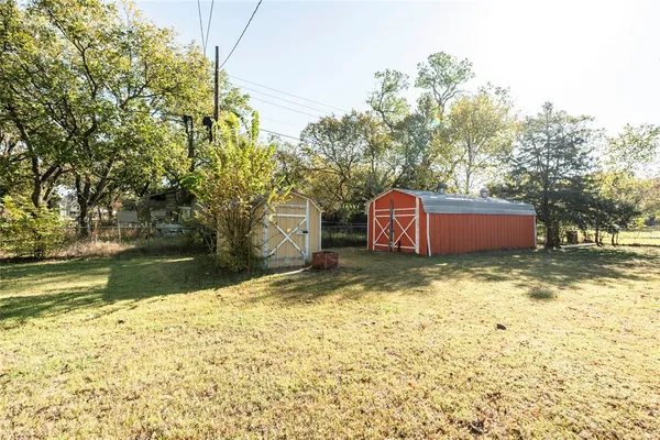 a view of backyard with green space