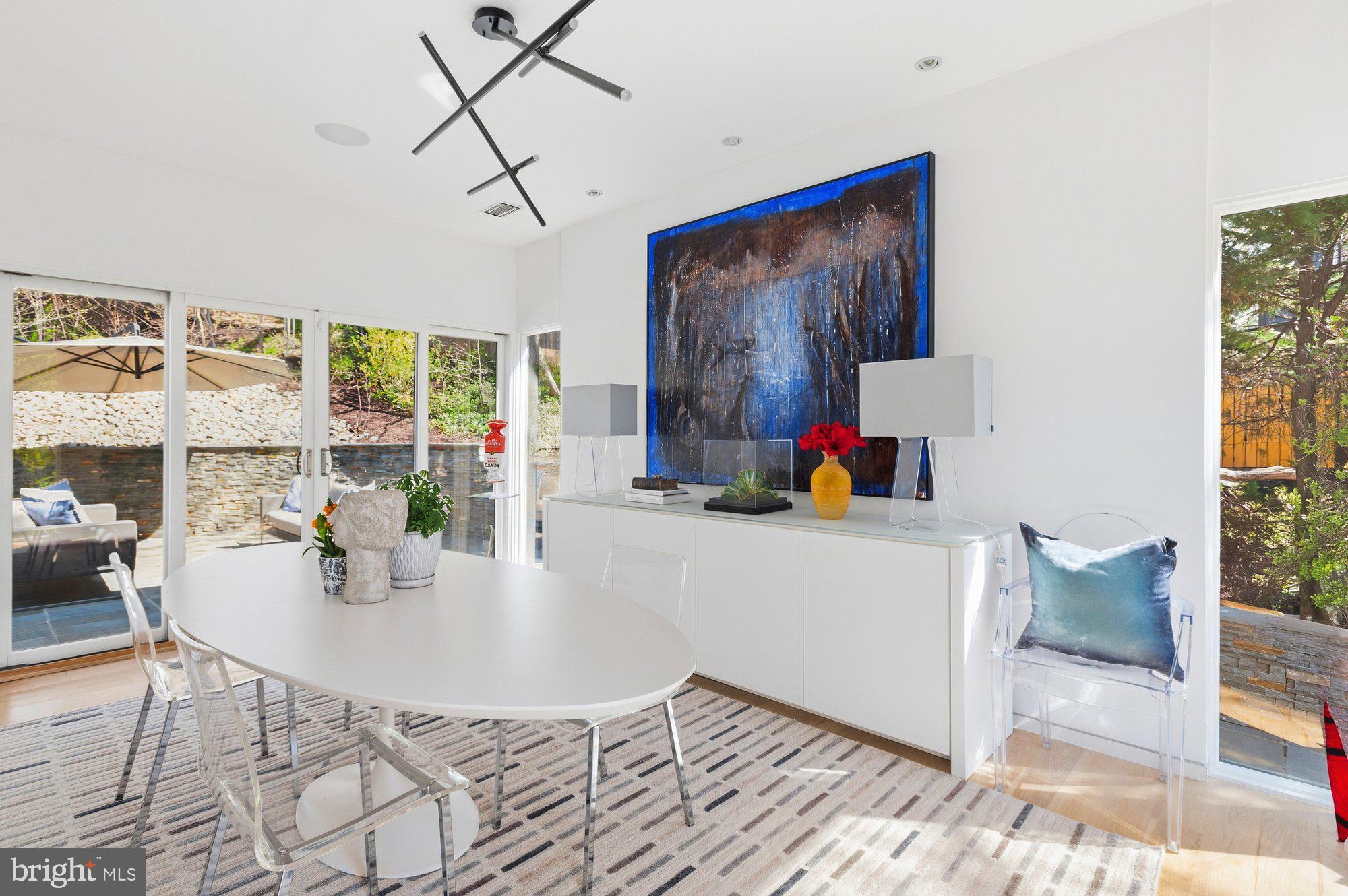 6016 Chesterbrook Road McLean, VA 22101 - Photo 18 of 67 a living room with furniture and a painting on the wall