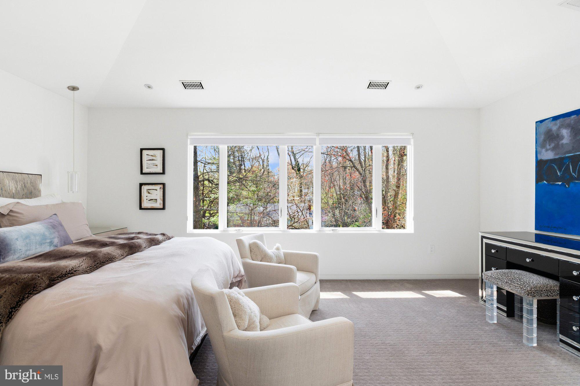6016 Chesterbrook Road McLean, VA 22101 - Photo 32 of 67 a bed room with a bed and a couch