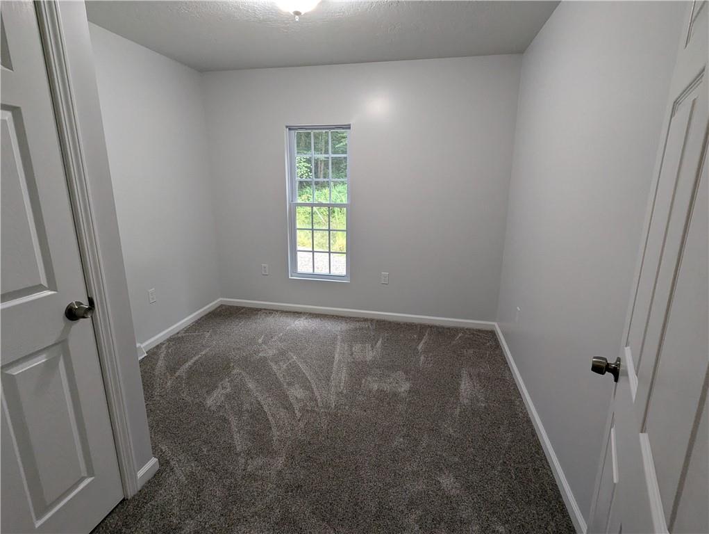 362 Palmer Road Butler, PA 16001 - Photo 15 of 32 an empty room with a window