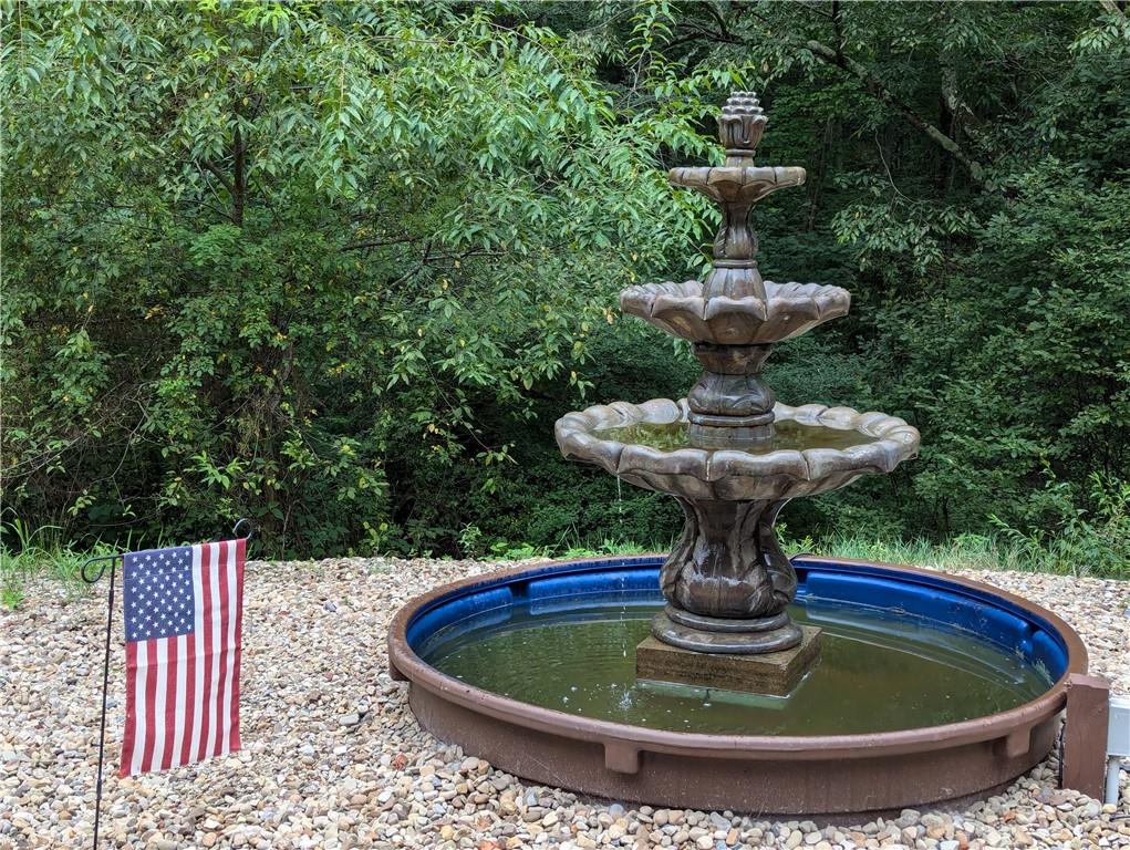 362 Palmer Road Butler, PA 16001 - Photo 4 of 32 a view of a fountain in the patio