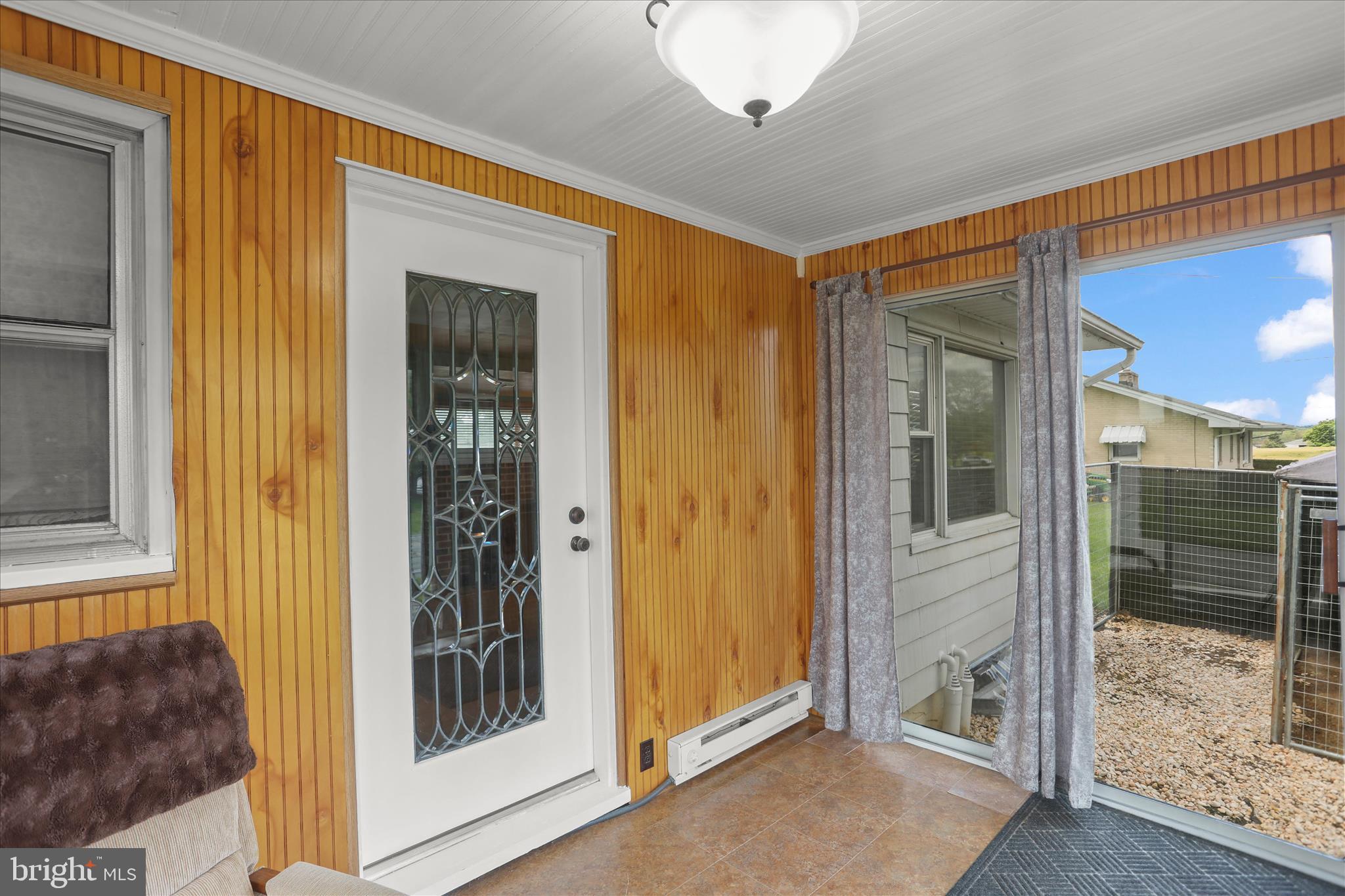 6 South Grant Road Thomasville, PA 17364 - Photo 21 of 49 Front Enclosed Porch w/Kennel Access