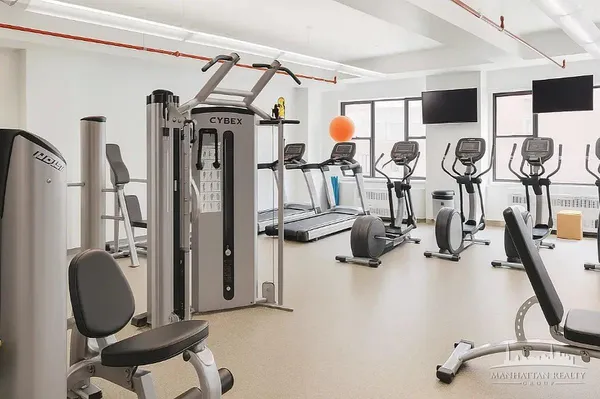 a view of a room with gym equipment