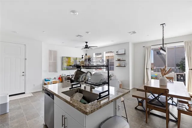 a living room with furniture and a table